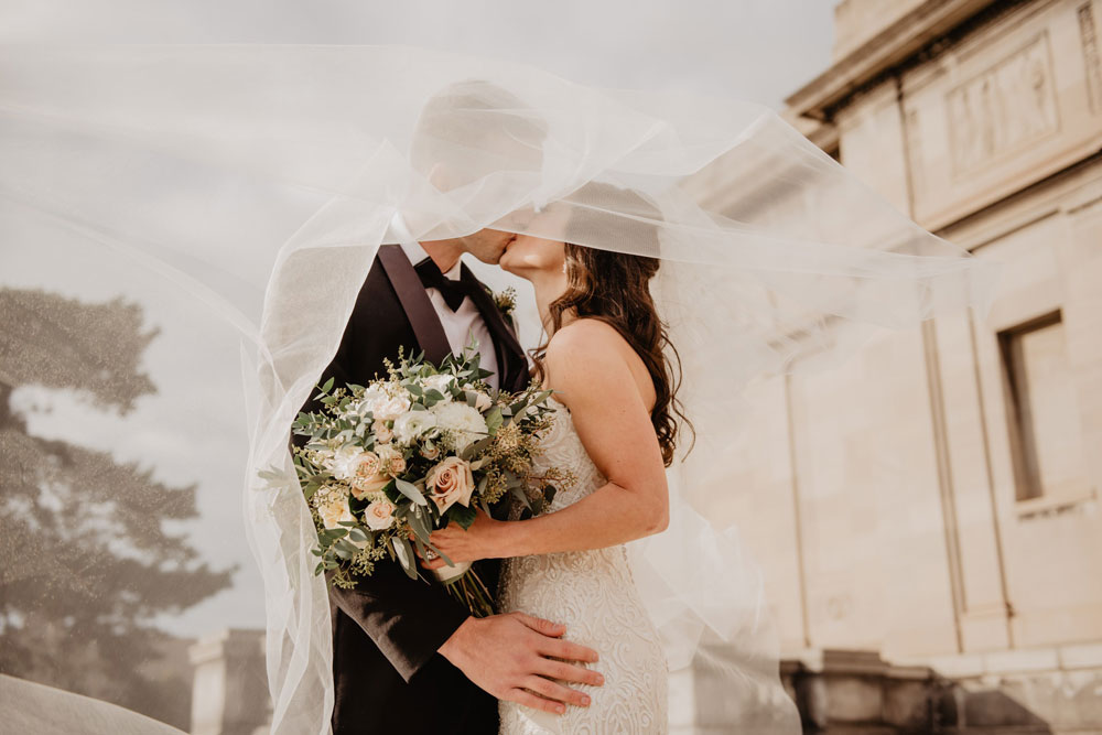 A couple dressed for an elegant celebration